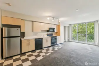 Discover your peaceful escape in the city—an urban retreat with a private, tree-lined view nestled in vibrant downtown Bellevue.