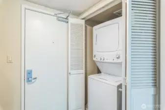 Conveniently situated near the elevator and refuse closet, this unit also includes a secure parking space and a dedicated storage room in the common garage, located just steps from the entry for added ease and accessibility.