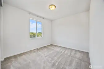 one of two upper bedrooms