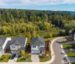 Aerial view of the home on the corner and territorial view.