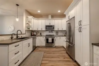 Great layout in the kitchen - ample room to move around. Lots of storage. Propane cooktop and pot filler for the serious chef