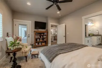 Primary suite has door out to patio