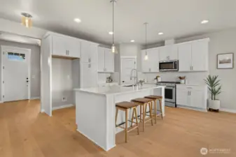 Photographs are for illustrative purposes only. Features, finishes, interior/exterior colors, landscaping and floorplan shown may vary from actual homes built.