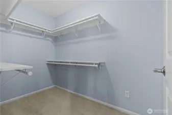 One of two closets in the secondary suite.