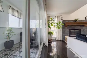 Surrounded by windows, this sunroom brings the beauty of the outdoors inside.