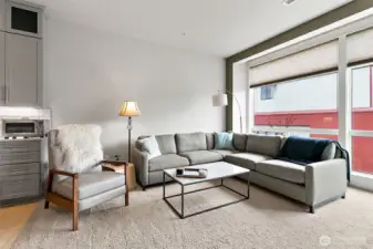 The expansive living area offers ample space for comfortable seating and stylish decor.