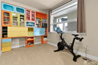 Work from home?  This guest bedroom has plenty of built-ins that maximize storage and enhance the room's sleek modern aesthetic.