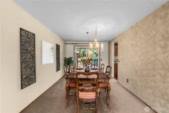Nice sized dining room area with sliding door access to covered back deck.