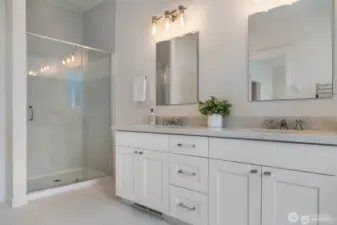 1st primary full bath, dual sinks and towel warmer.
