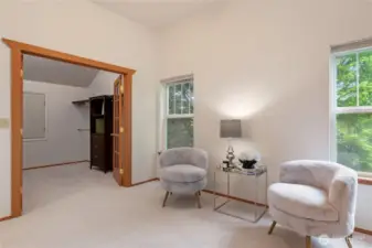 Spacious seating area designed to accommodate a couch, chairs, and provide a comfortable environment for relaxation.