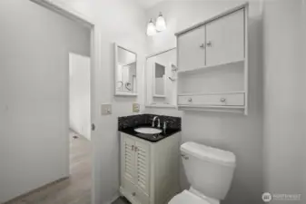 Full hallway/guest bathroom that has been updated.