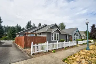 Corner Lot with an alley for a back entrance garage gives this house even more Wow Factor!