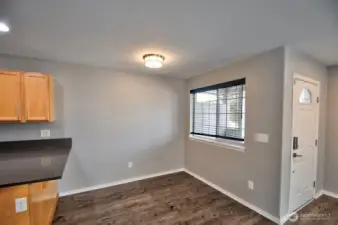 Another Angle of the Dining Room and Entry, front door.