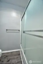 Upgraded glass shower doors.