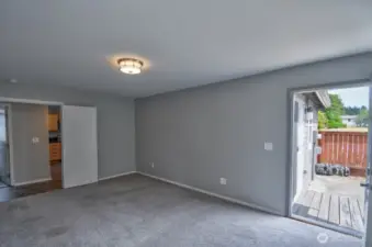 Primary Bedroom, showing the door to the side yard.