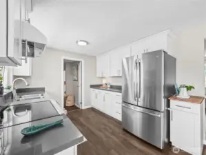 Kitchen opens to laundry and bonus toom