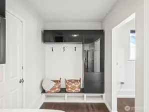 Mud room cabinets in laundry help you stay organized - W/D included!