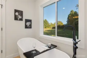 Primary Bath with Endless Views from this Spa Soaking Tub ...