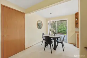 Dining room opens to spacious back yard Brazilian hardwood deck.