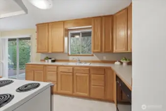 Kitchen sink window to back yard viewing.