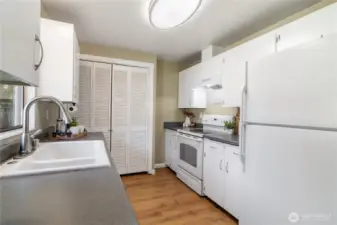 generous galley kitchen with plenty of cupboard space