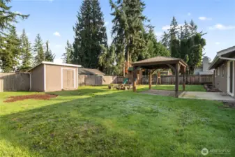 Large fenced back yard ready for your pets