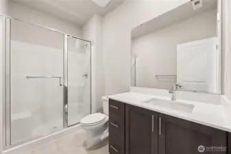 Main floor 3/4 bath, next to bedroom or den.