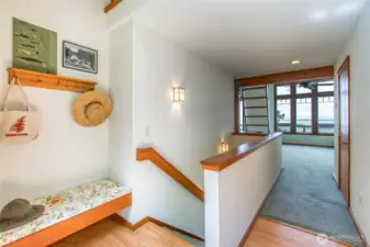 Foyer with charming bench.  To the right, out of sight in this photo, is a coat closet.