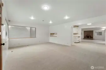 Incredible flow to this home's layout with natural lighting from large picture windows!