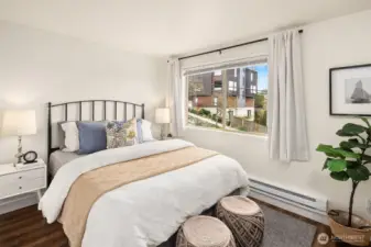 Natural light abounds. Enjoy peekaboo city views from one bedroom and expansive valley views from the other.