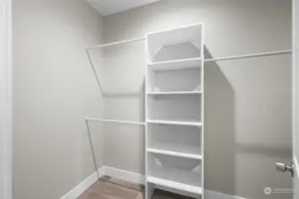 Primary walk in closet.