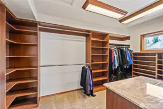 Primary suite with two large walk-in closets.