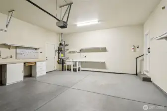 Attached Two-Car Garage complete with Man-door access to the yard