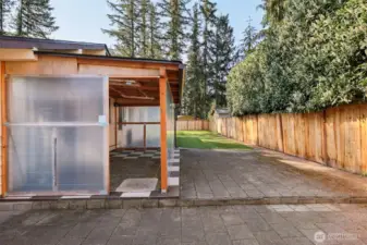 Large patio space and covered/enclosed space.
