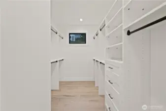 Huge custom primary walk-in closset!