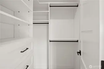 & walk-in closet w/custom cabinets!