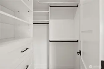 & walk-in closet w/custom cabinets!