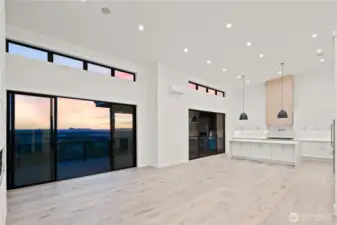 Inside, discover soaring ceilings, walls of glass, & curated designer finishes.