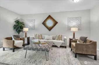 The large living room has 2 seating areas