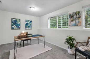 This is the room on the garage level. It could be a forth bedroom or a play room or an office. So much fresh paint!