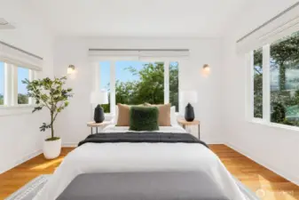 Upstairs primary suite with Mt. Rainier and city light views