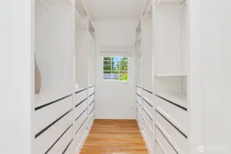 Walk-in closet of upstairs primary suite