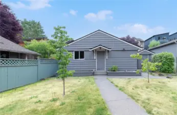 An expansive backyard offers a rare combination of privacy and opportunity in the city… also Honeycrisp apple, plum and Dogwood trees!