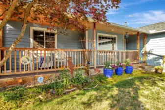 Lovely front porch to enjoy your morning cup of coffee from.