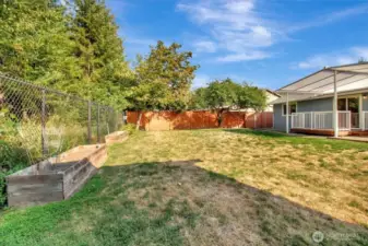 Backyard is fully fenced.  Back fence allows a view into the greenbelt behind the house.