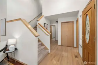 Welcoming entry with vaulted ceilings and hardwood flooring!