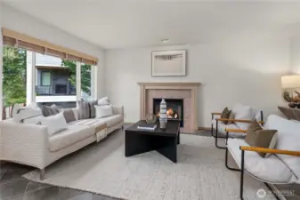 Oversized windows flood the space with natural light, beautifully bringing the outdoors in.