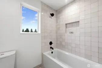 Showing the full shared bathroom.