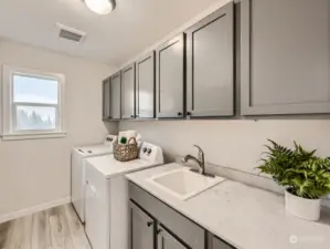Laundry room   photo of another model home, finishes may vary. For illustrative purposes only.