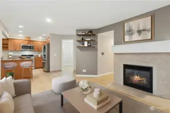 Family room off the kitchen with cozy gas fireplace